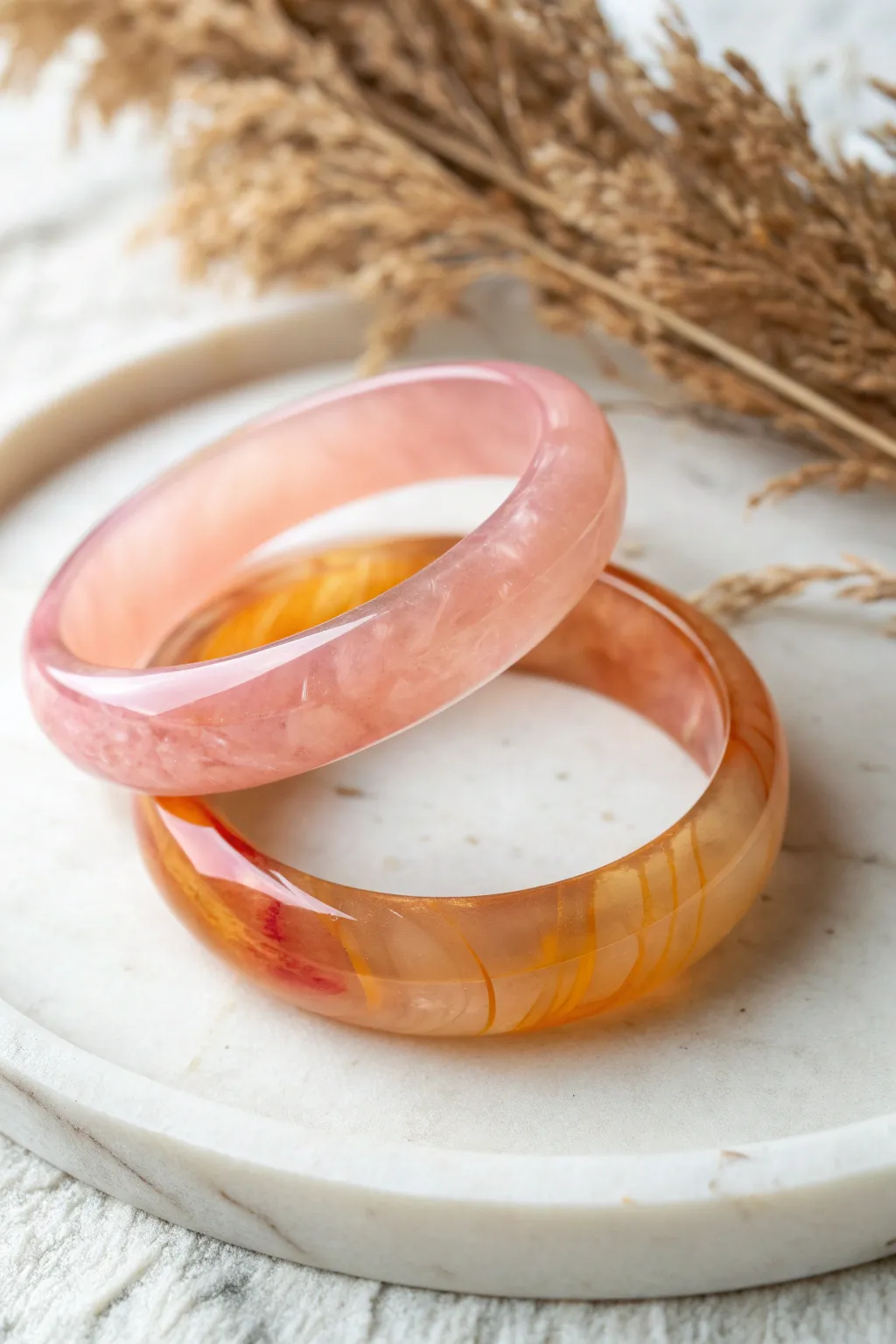 Glowing ombre jelly bangles in tinted translucent clay, backlit for soft candy-like shine