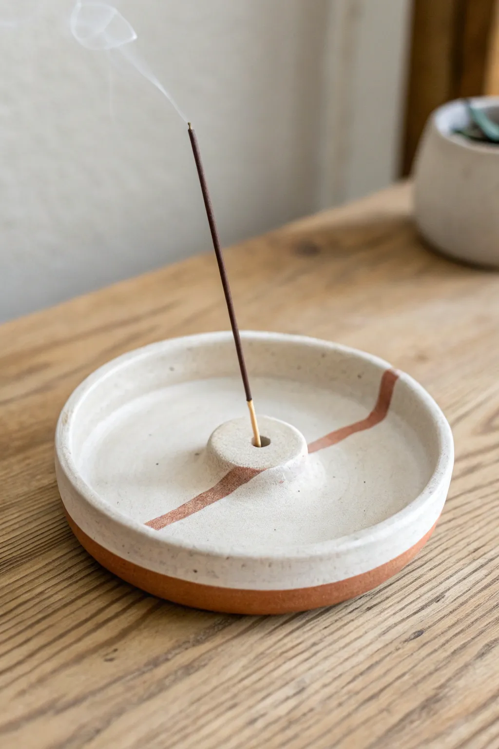 Modern air dry clay incense dish with a simple stripe detail, clean hole, and calm Nordic vibes
