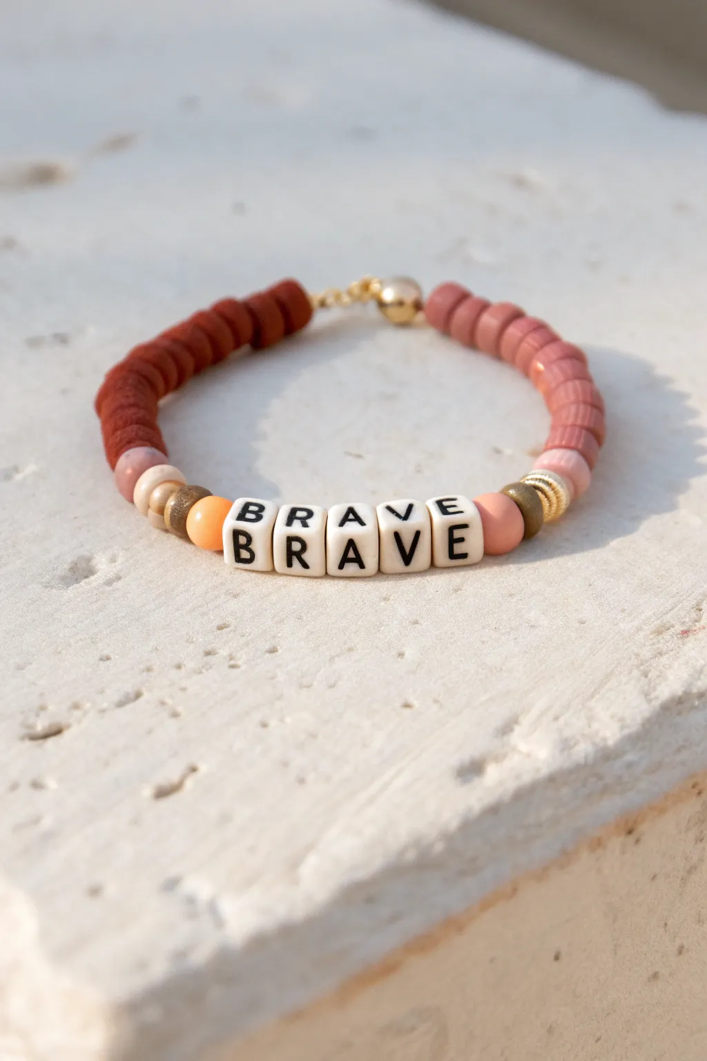Chunky color block clay heishi bracelet featuring BRAVE, minimalist boho vibes for you.
