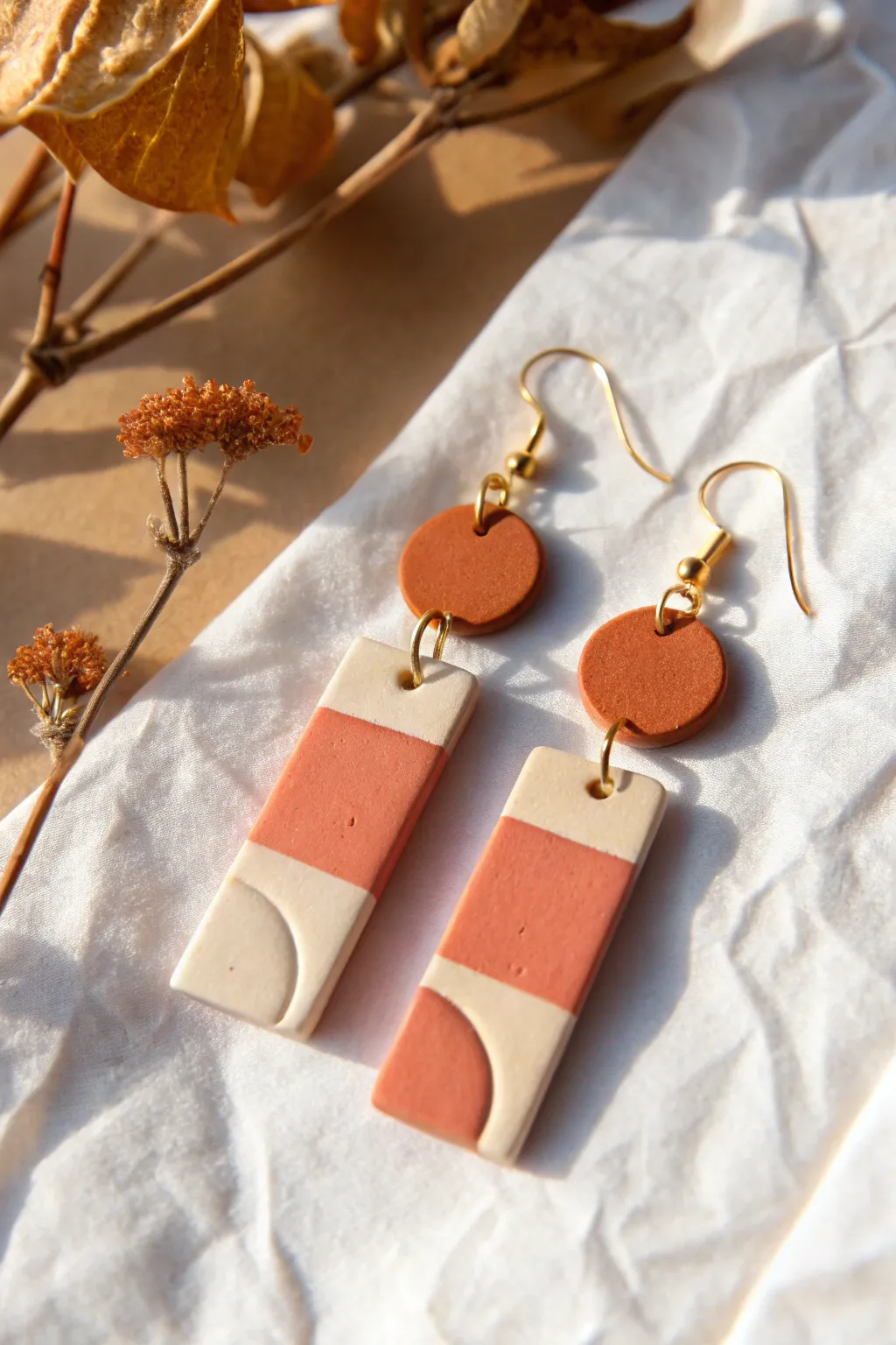 Clean color-block clay geometrics with warm earthy tones, photographed in a crisp minimalist flatlay