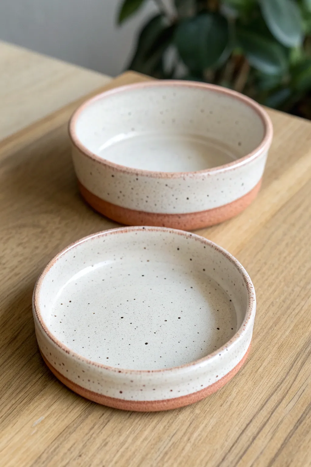 Two nesting trinket dishes that unite into one shape, minimalist, boho-soft, and handmade