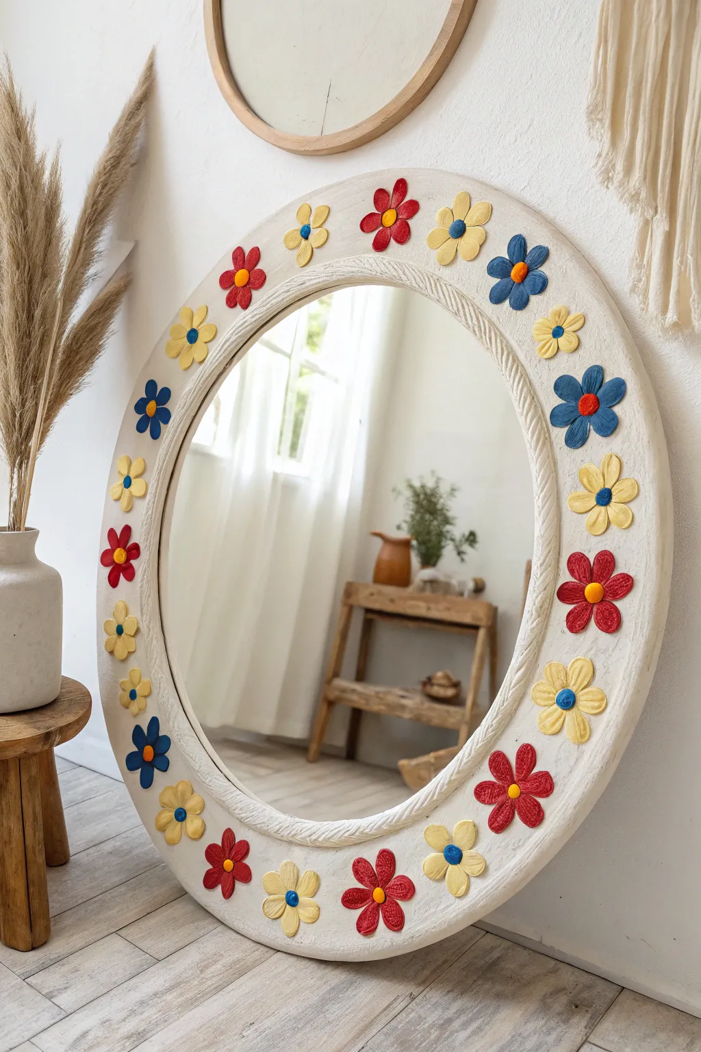 Primary-color clay flower mirror frame that pops in a soft Scandinavian-boho corner.