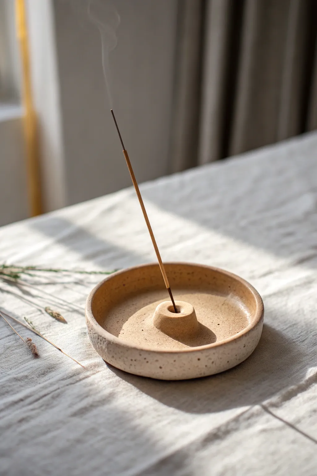 Minimal handmade clay incense holder in soft sand tones, perfect for calm, smoke-kissed rituals.