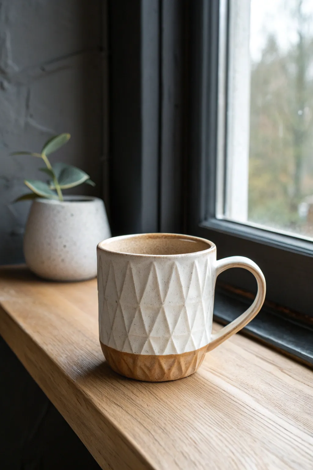 Subtle faceted mug with pooling glaze, minimalist Scandinavian look with a soft, modern boho feel.