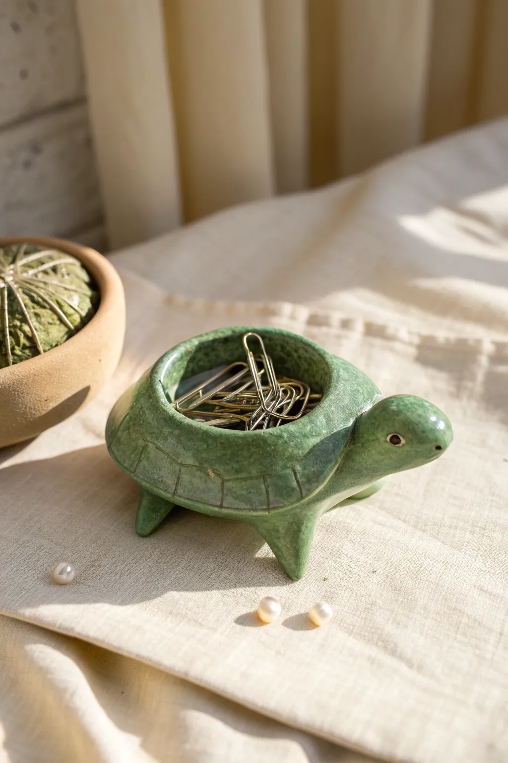 Tiny green turtle pinch pot with shell texture, perfect for holding beads or paper clips