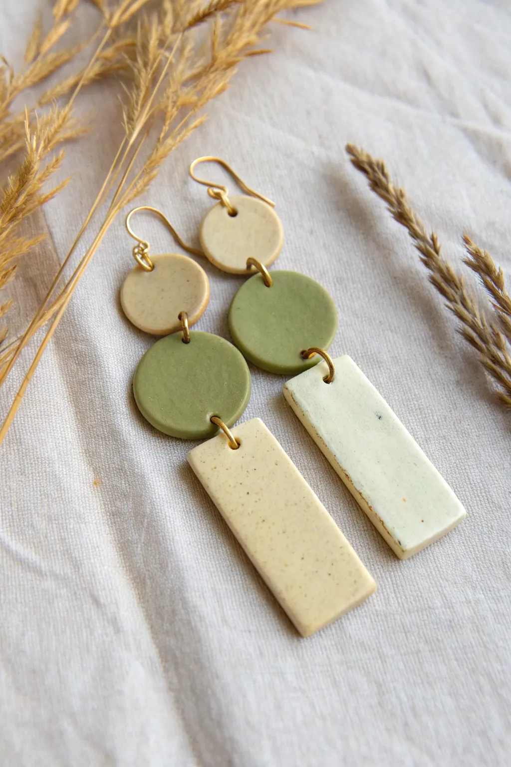 Easy color-blocked slab earrings in cream and sage, clean seams and modern minimalist charm