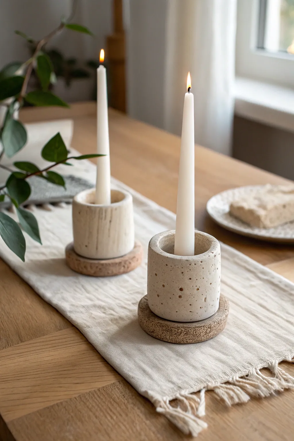 Simple textured clay candle holders that add cozy Scandinavian calm to any table