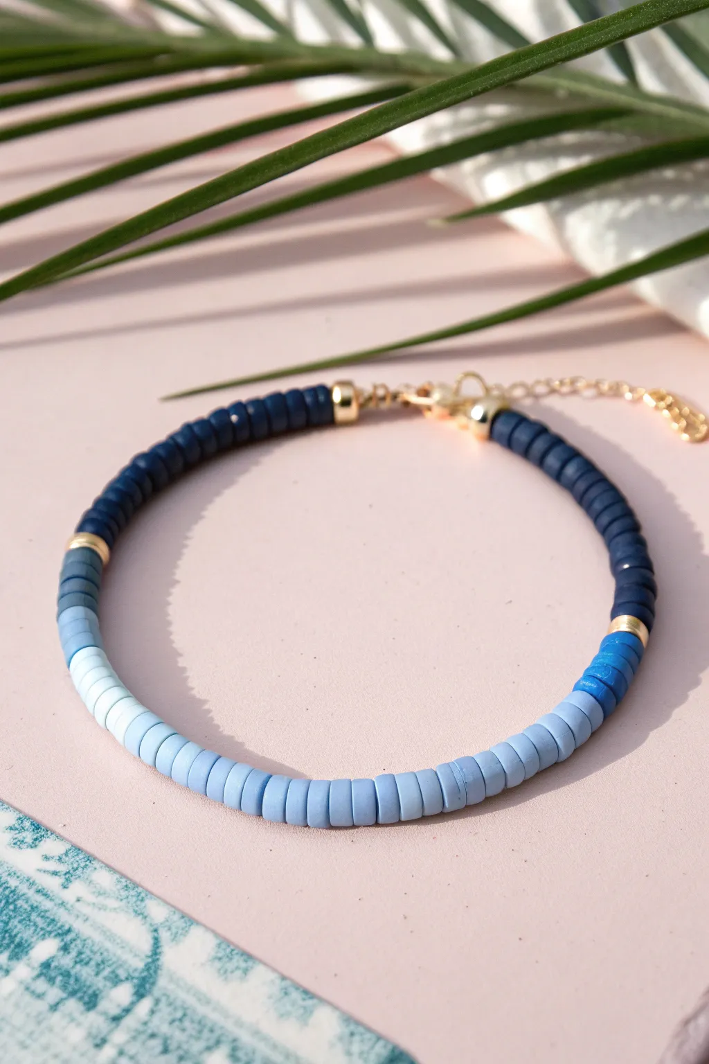 Ombre heishi bracelet inspiration: a soothing navy-to-sky fade with clean minimalist charm.