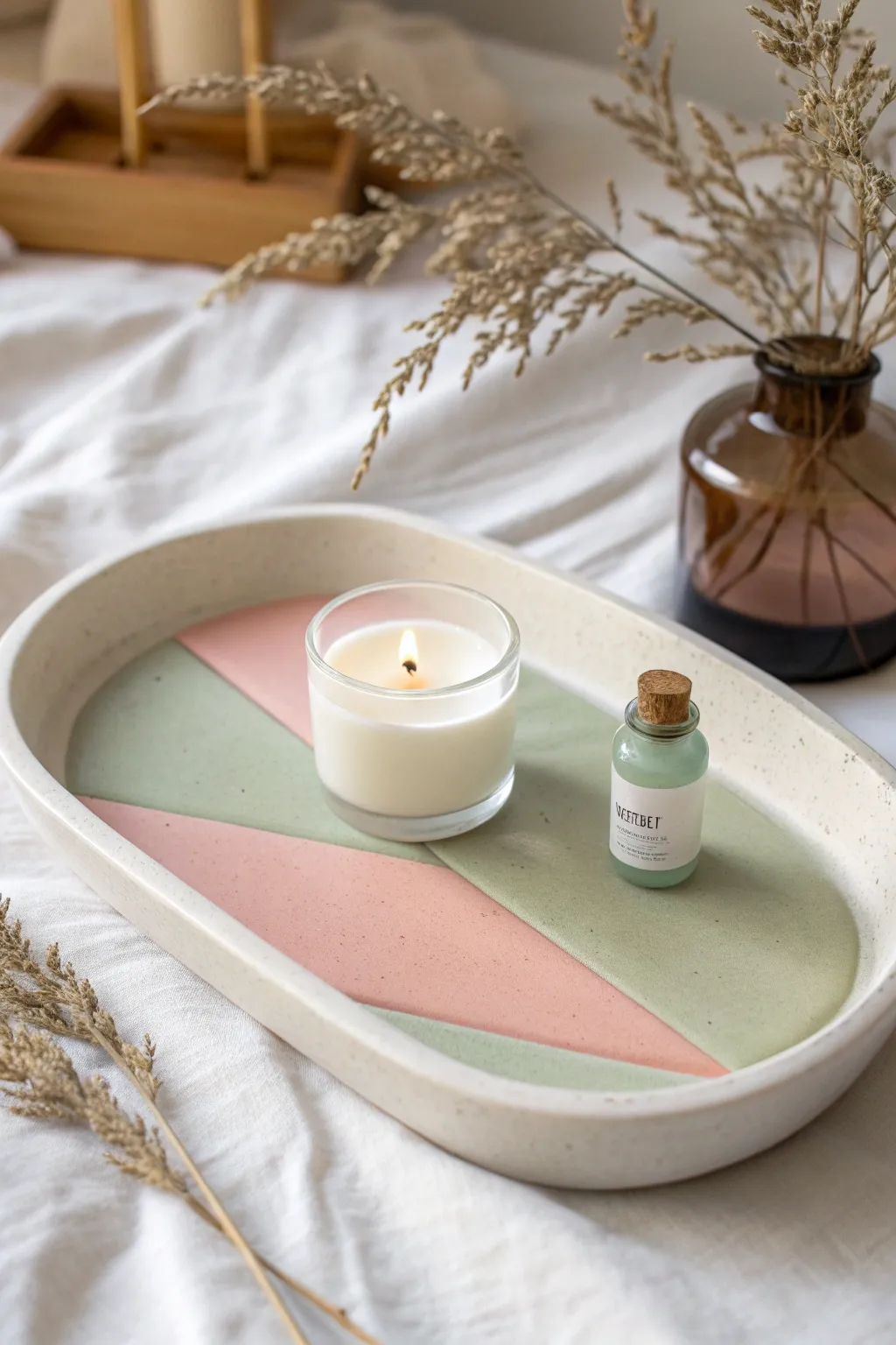 Pill-shaped candle tray in sage and blush color blocking, minimal, preppy, and handmade