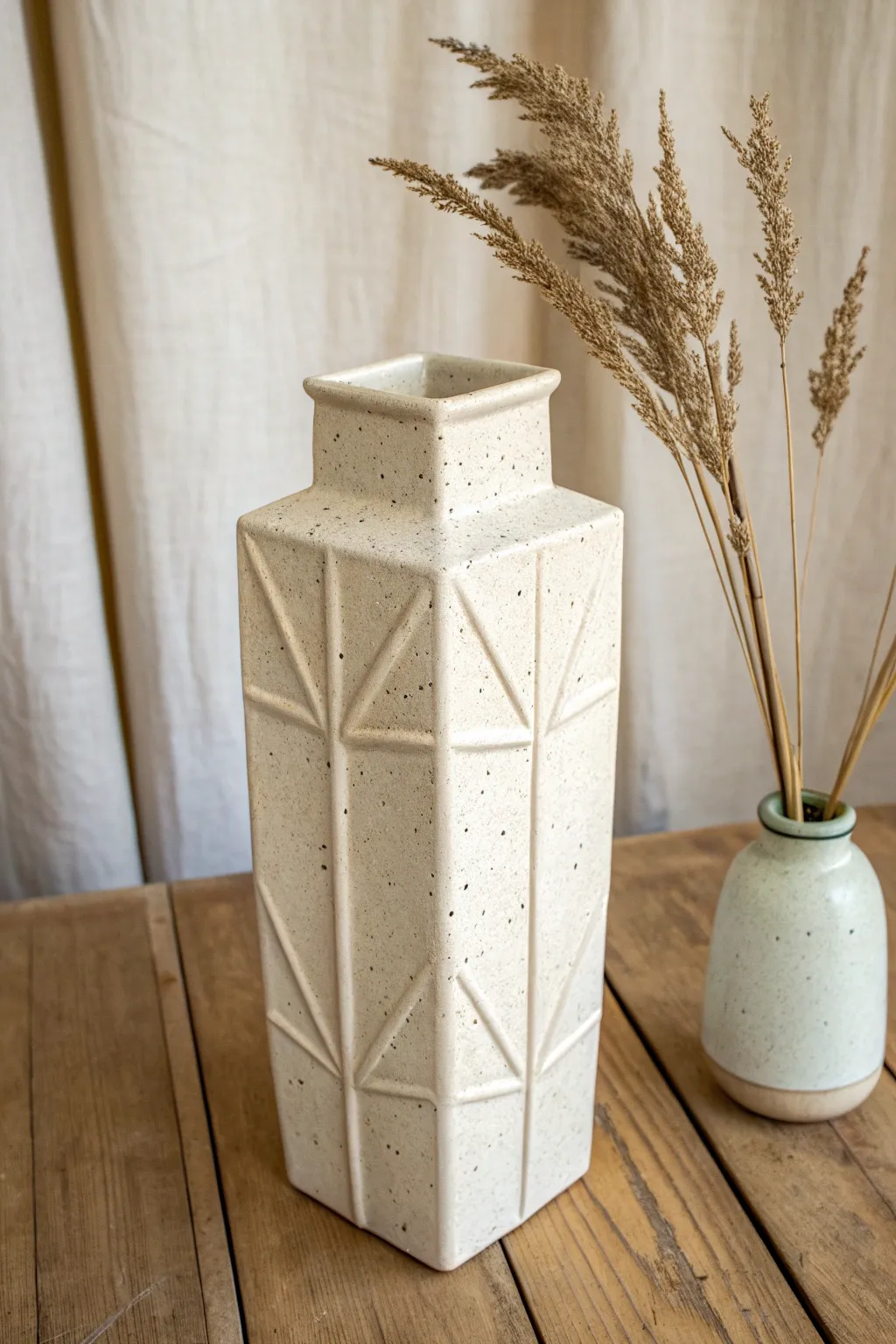 Crisp stiff-slab panel vase with clean joins and a calm Scandinavian look, easy to recreate.