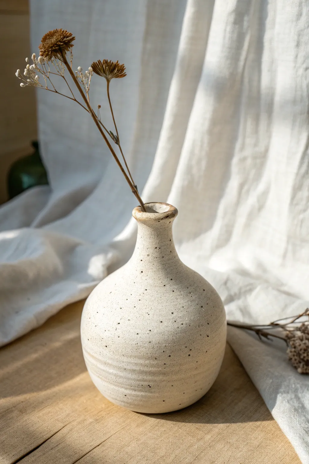 Wheel-thrown bud vase with a narrow neck and rounded belly, perfect for collaring practice