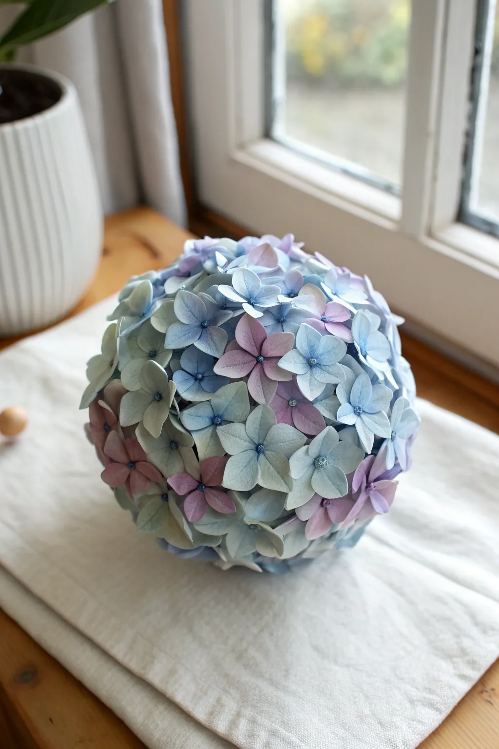 Soft blue and lilac air-dry clay hydrangea cluster, made from mini blossoms as one statement piece.