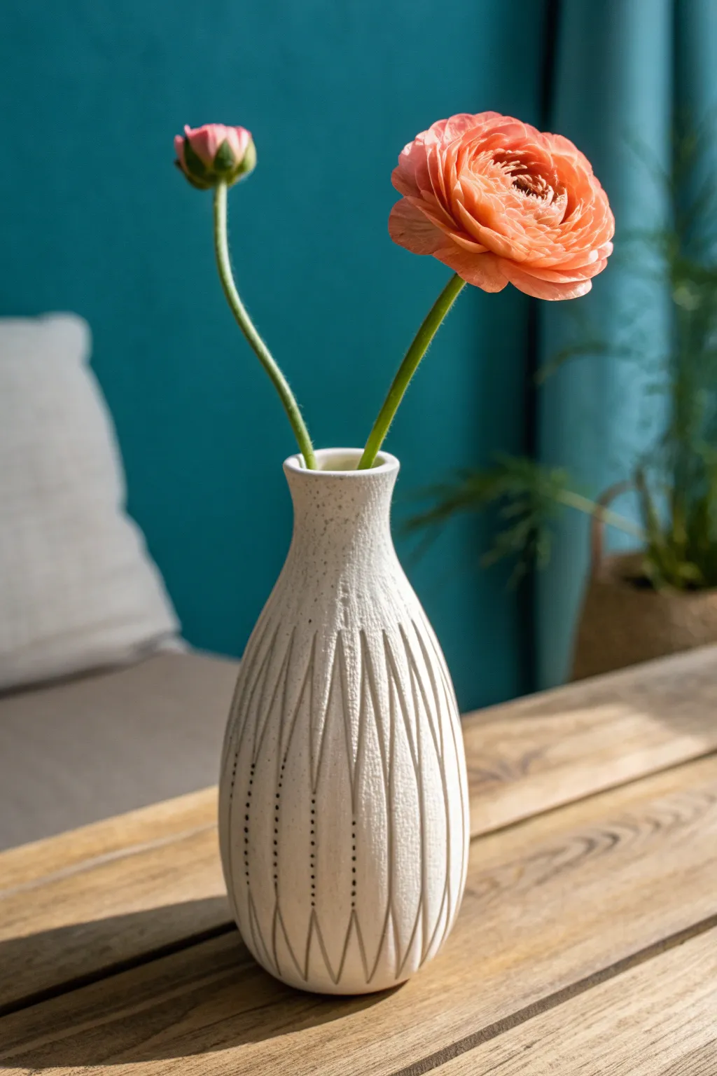 Matte ivory carved-line bud vase with a single bold bloom, minimalist boho DIY inspiration