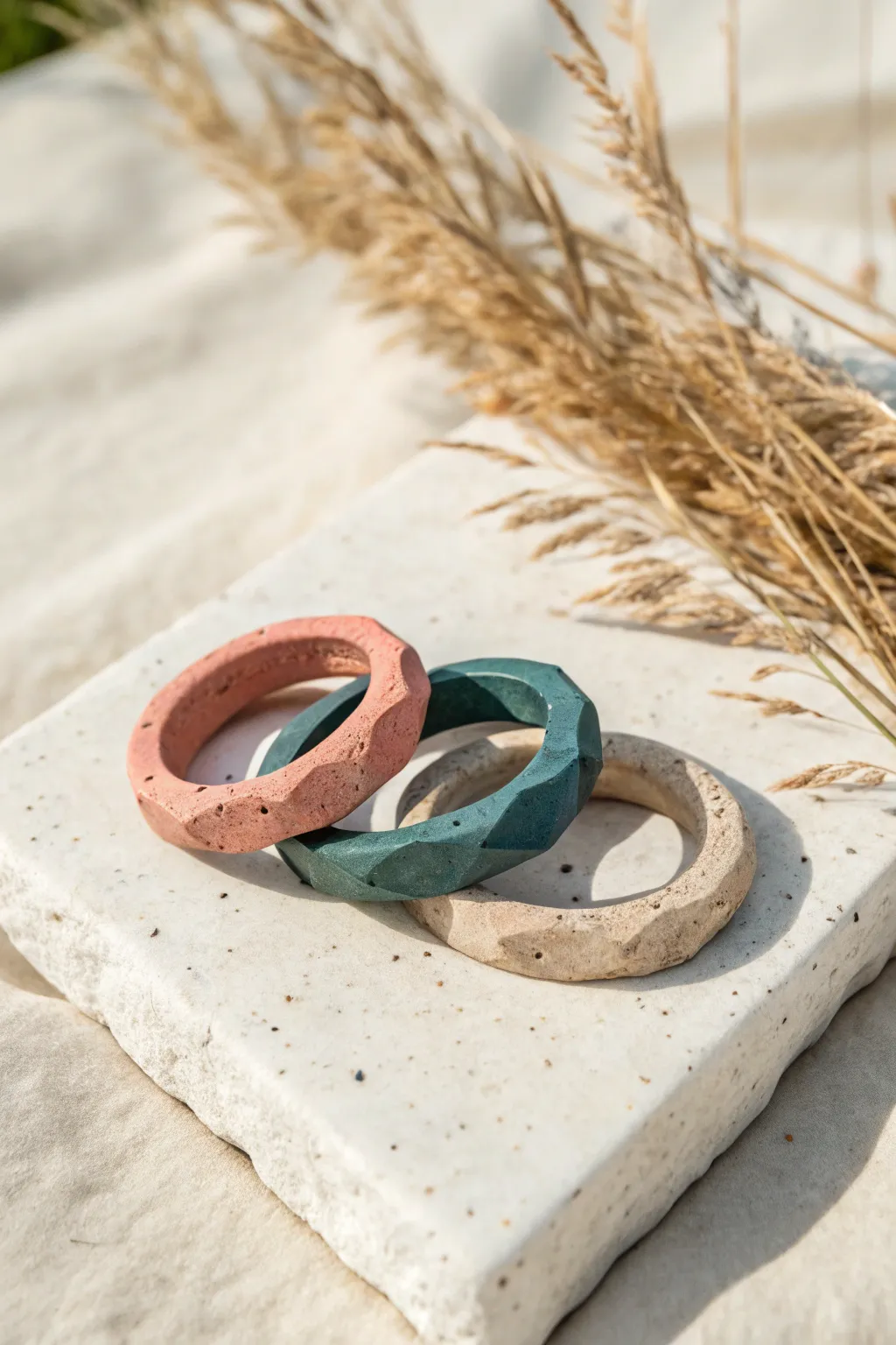 Stackable geo air-dry clay rings in bold earthy tones, minimalist styling for easy DIY jewelry.