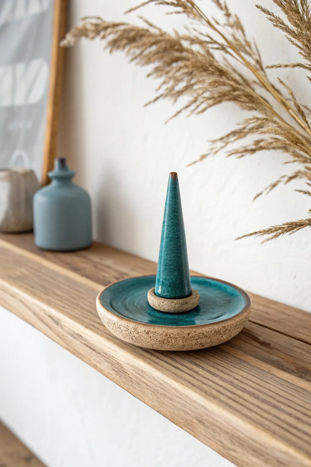 Minimal ceramic incense holder with clean groove, bold glaze, and airy Scandinavian shelf styling