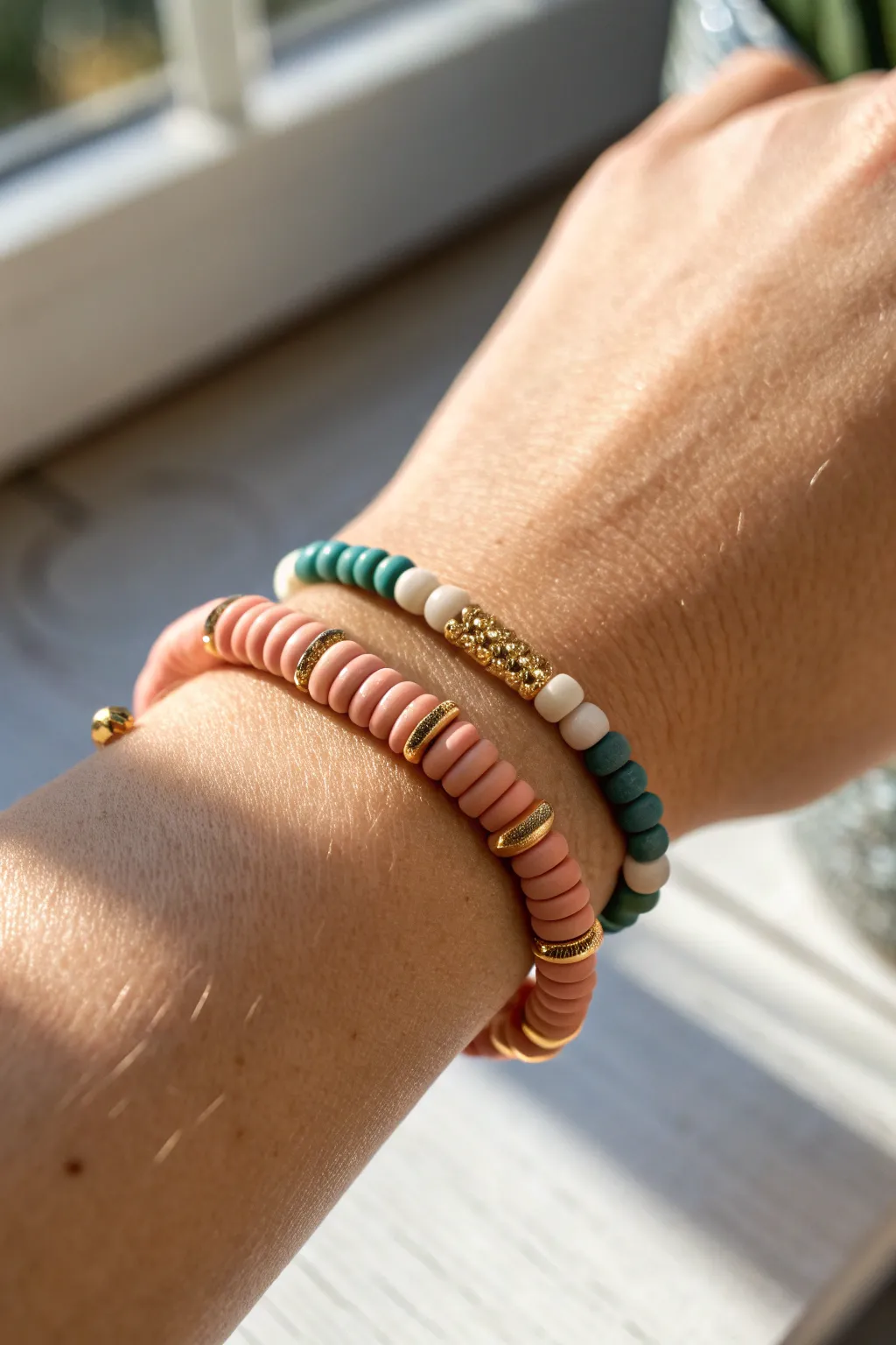 Gold spacers add rhythm to bold clay heishi beads for a polished, minimalist-boho bracelet.