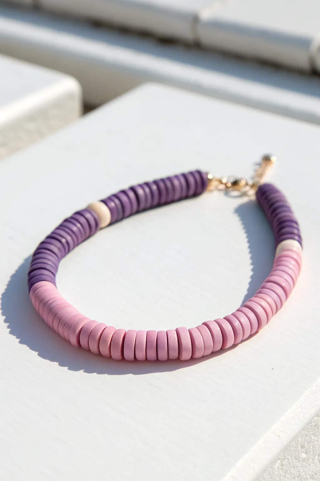 Soft pastel ombre heishi bracelet in a lavender to blush fade, a simple dreamy idea for girls.