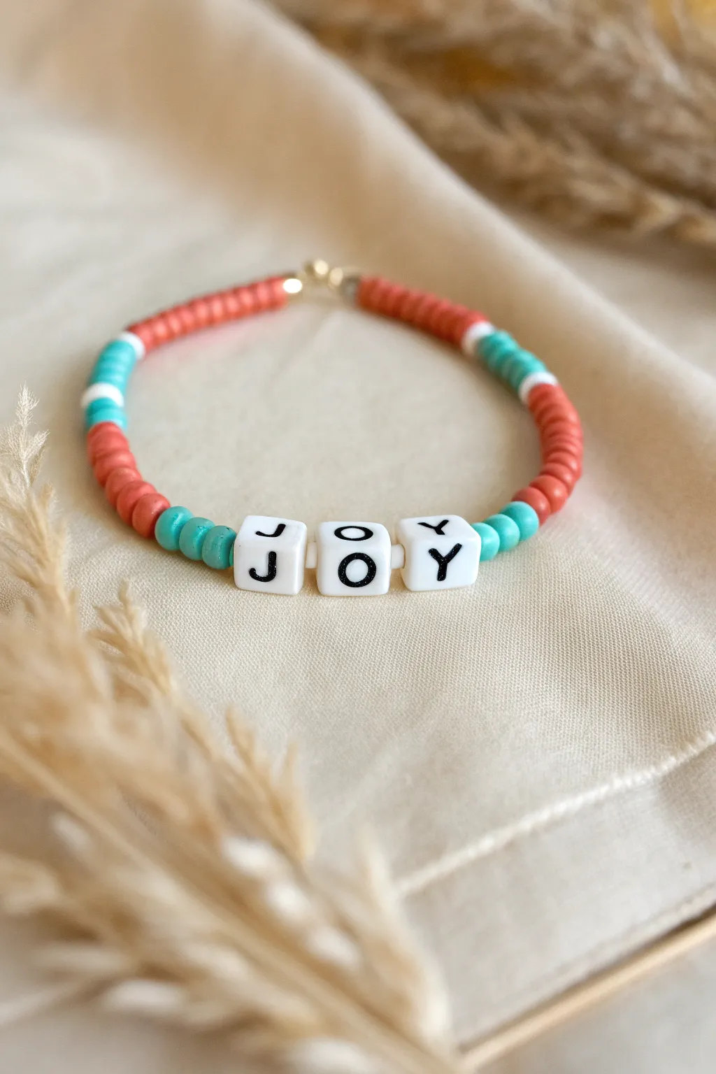 Bright heishi mood bracelet with JOY letter beads and bold accents, simple and easy to DIY.