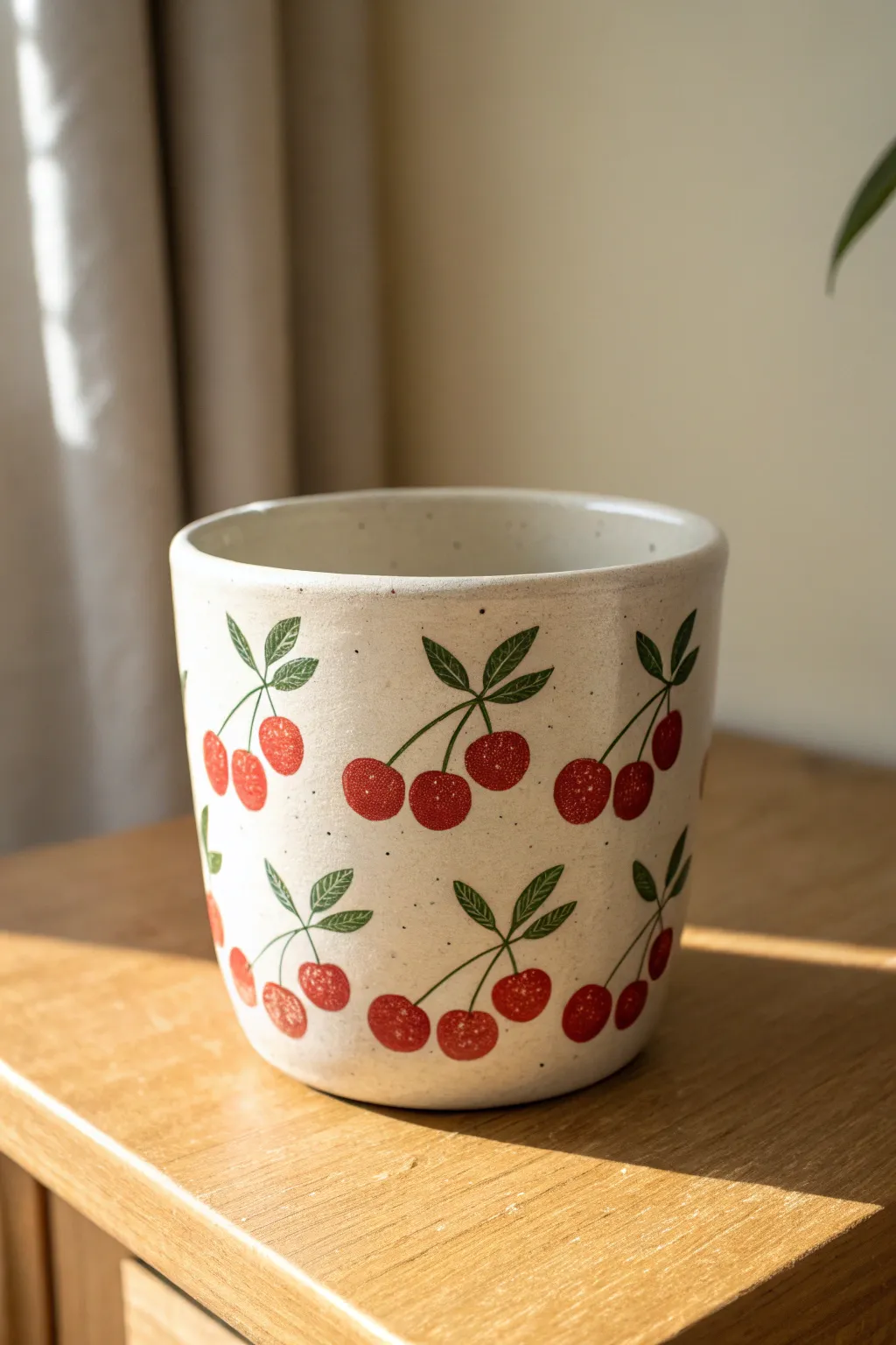 Simple cherry stamp pattern pot painting idea for kids, bold red pops on minimalist clay pot