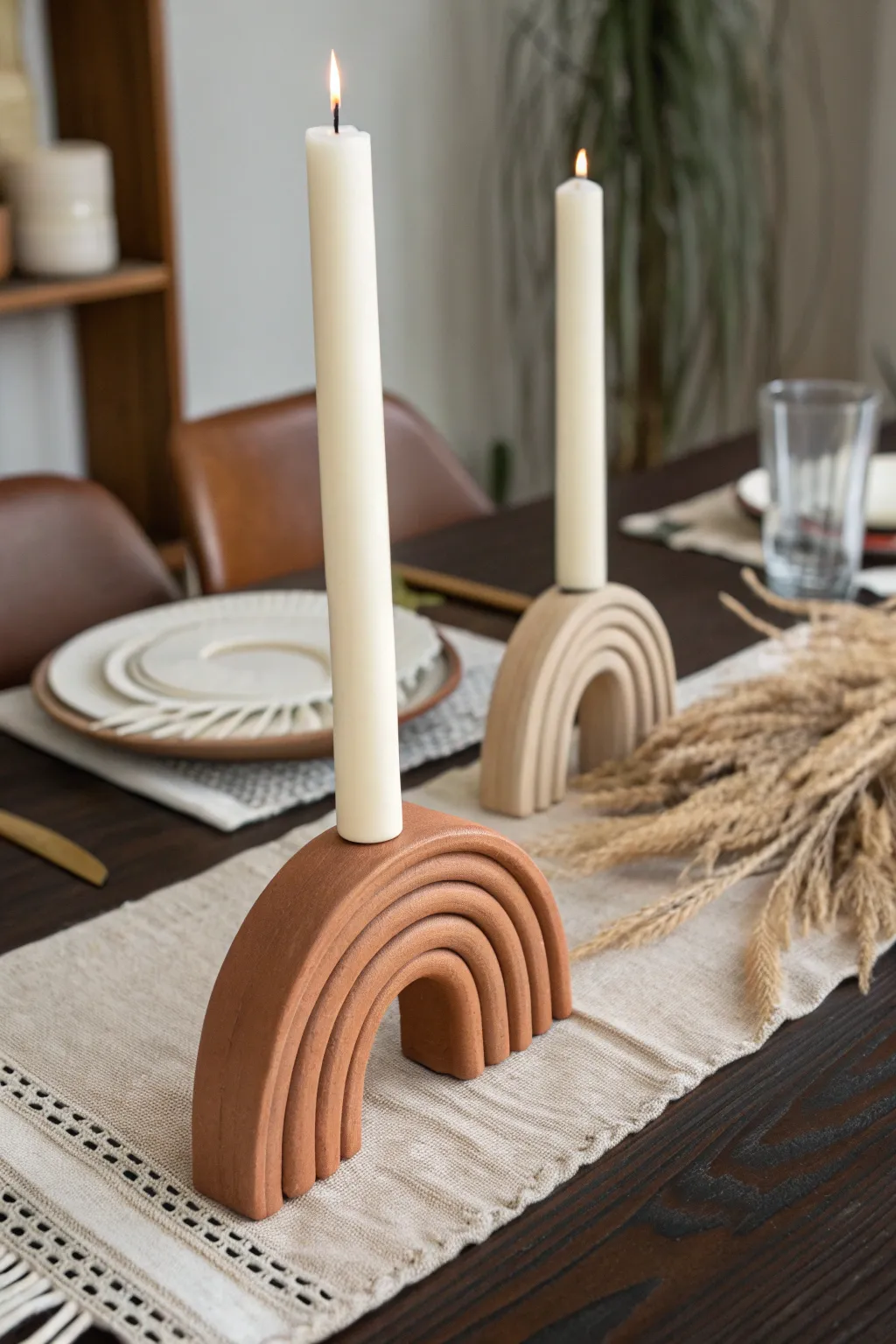 Warm matte arch candle holder duo brings sculptural calm to minimalist boho room decor