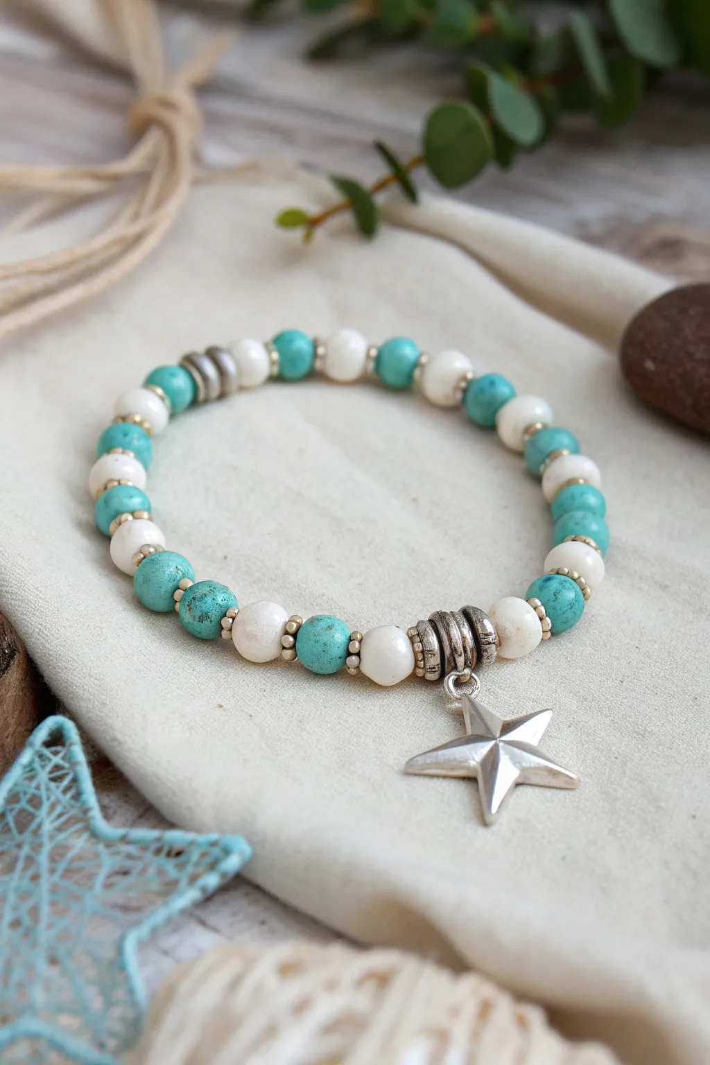 Turquoise and white clay discs with silver spacers and a Lone Star charm for cowgirl flair