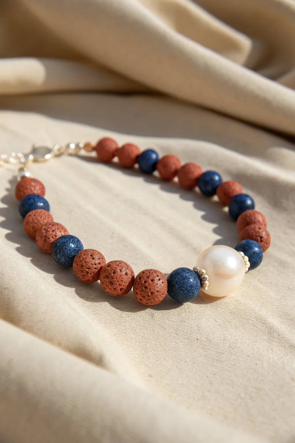 Single pearl centerpiece framed by colorful clay beads for an easy, elevated handmade bracelet