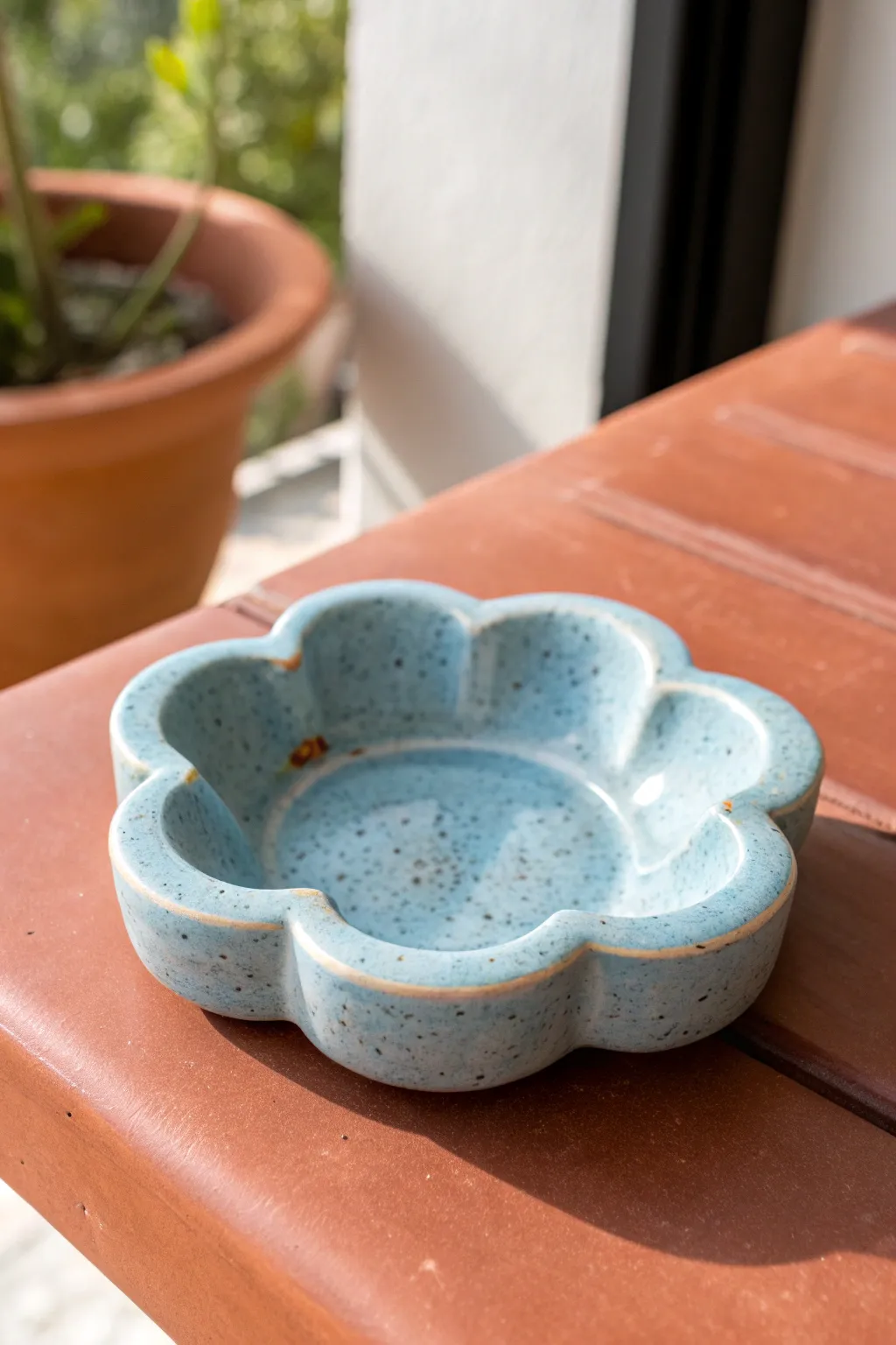 Soft cloud-shaped clay ashtray in airy blue, minimalist and dreamy with cozy boho charm.