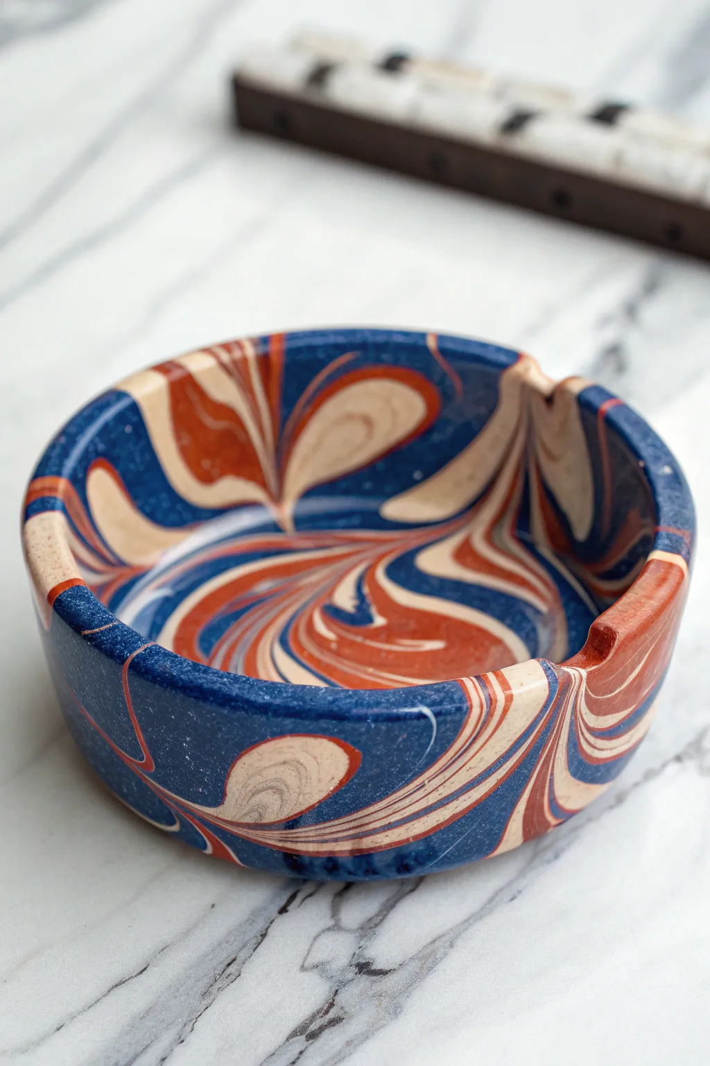 Glossy marbled polymer clay ashtray with clean notches, Scandinavian minimal with a boho pop.
