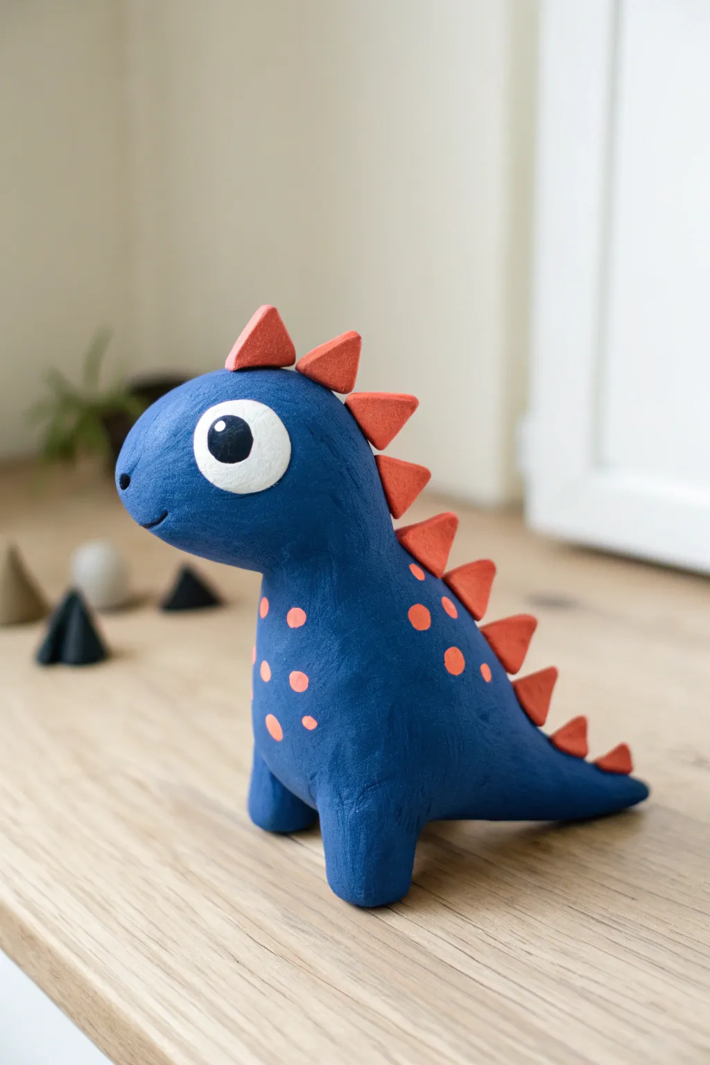 Beginner-friendly spiky dino-monster with one big eye and clean, even clay spikes
