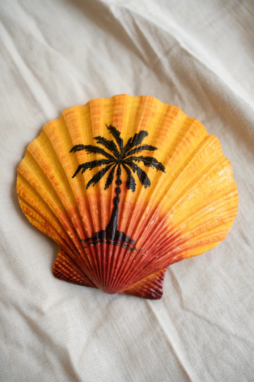 Capture the sunset with this easy palm tree silhouette shell painting idea. 🌅✨ Perfect boho summer decor.