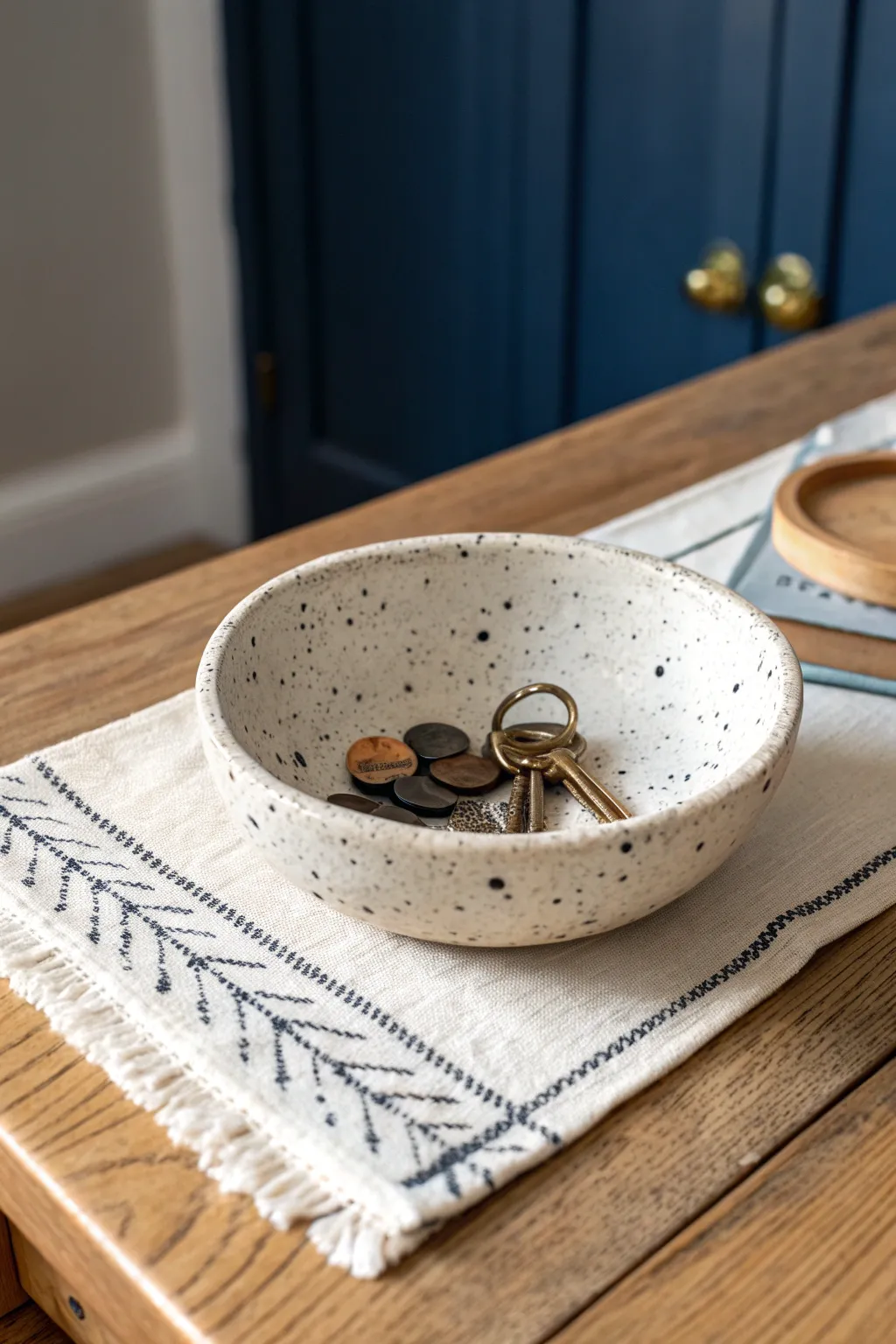Speckled faux-stoneware catchall bowl made from air-dry clay, perfect for keys and coins.
