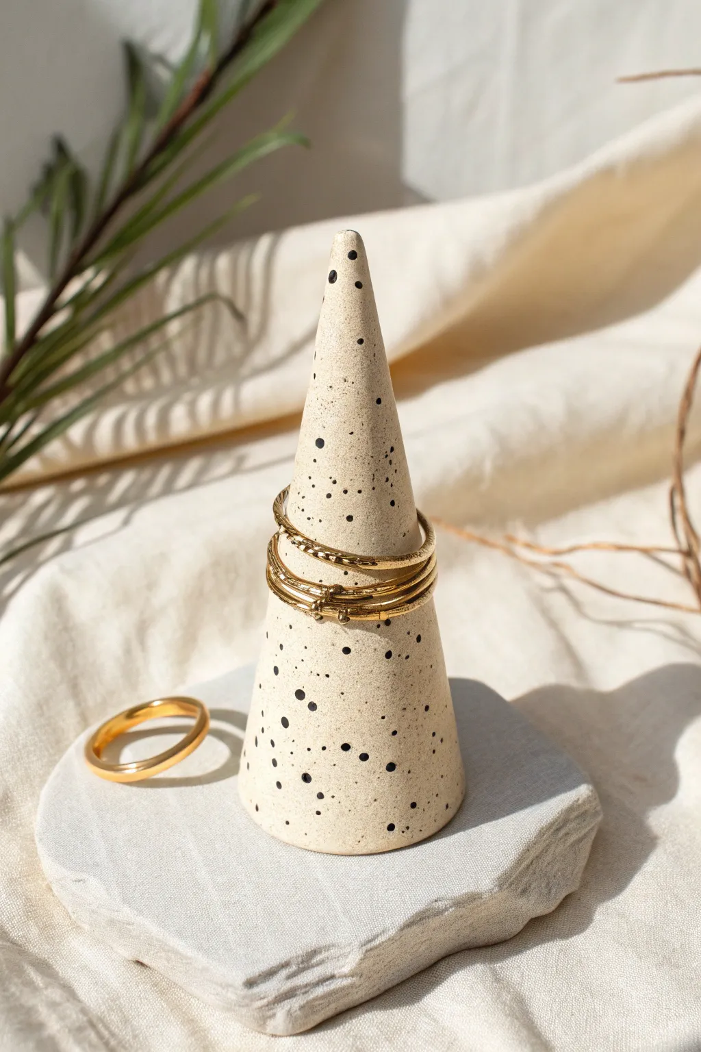 Minimal paper clay ring cone in matte speckled finish, a chic handmade keeper for your favorites