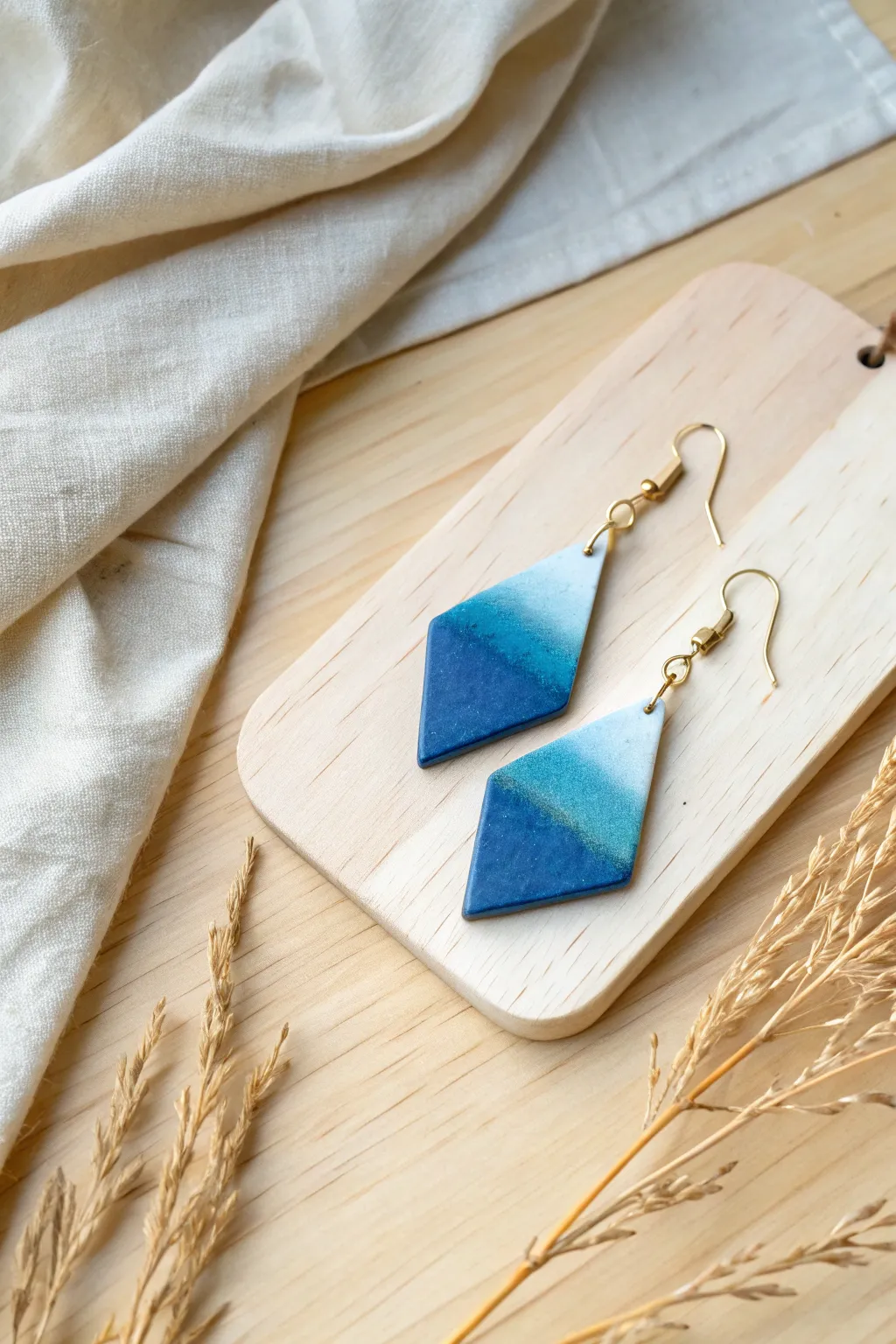 Ombre polymer clay slab with two earring cuts showing vertical and horizontal gradients