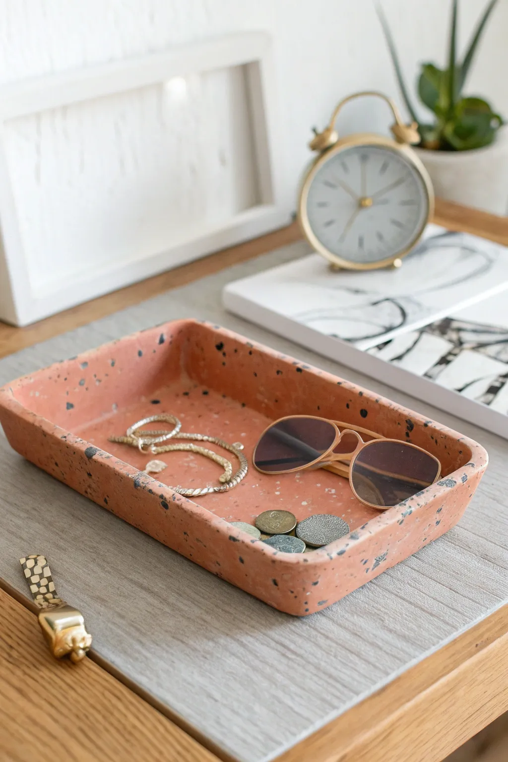 Terrazzo-style clay catch-all tray for keys and jewelry, Scandinavian minimalism with boho warmth.