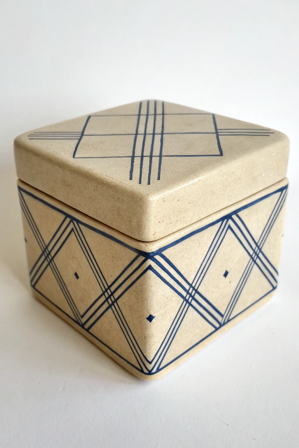 Modern mishima slab box in bold geometric lines, minimal Nordic style with boho warmth.