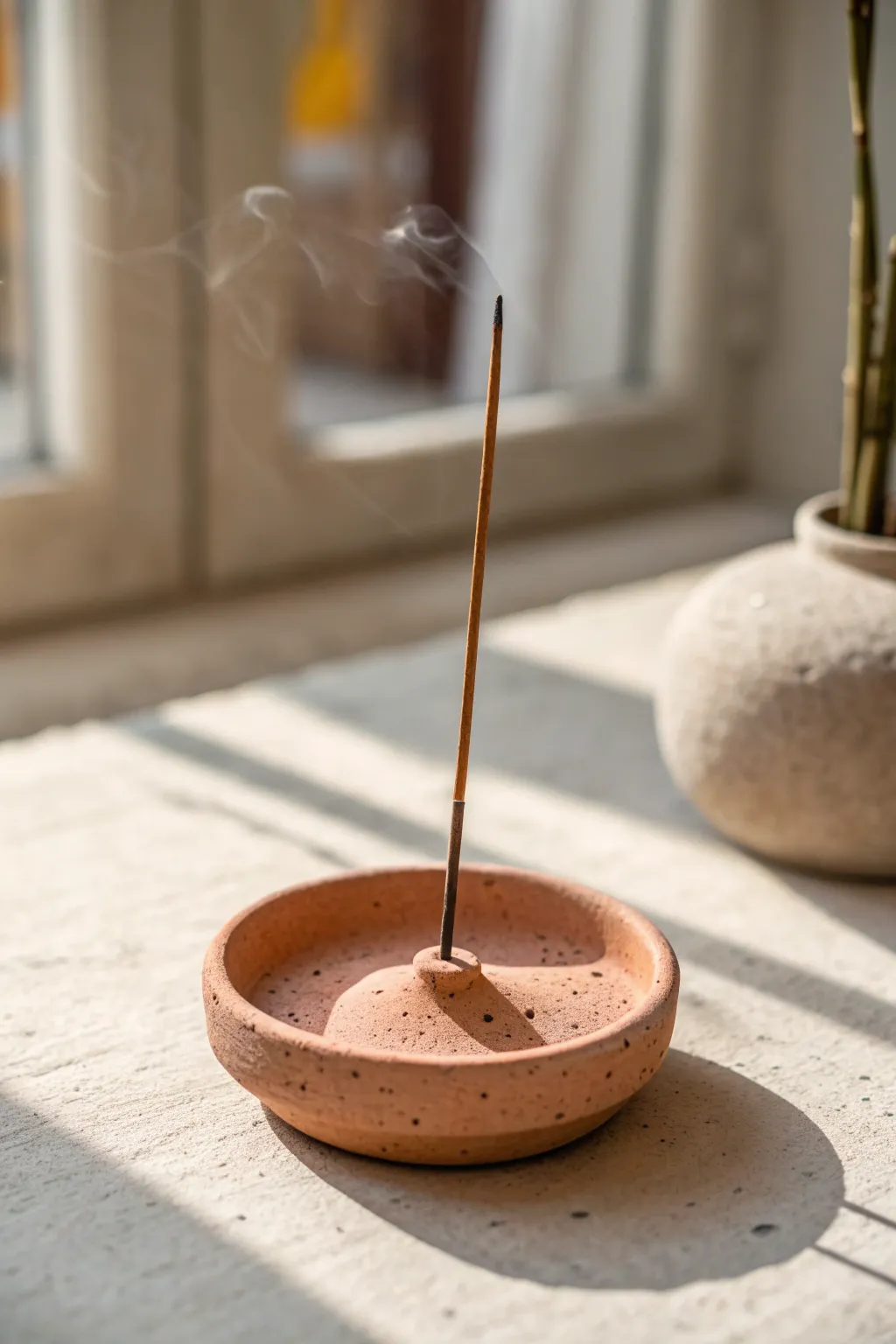 Mini oval clay incense holder with one clean groove, spa calm minimal style in bold terracotta.