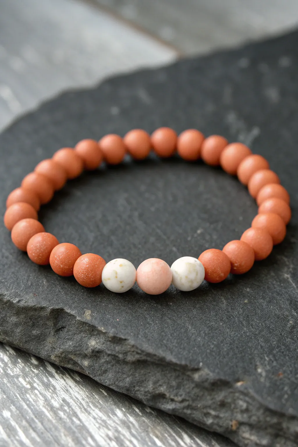 Orange–white–pink A-B-C repeat creates a simple sunset bracelet that looks clean, neat, and rhythmic.