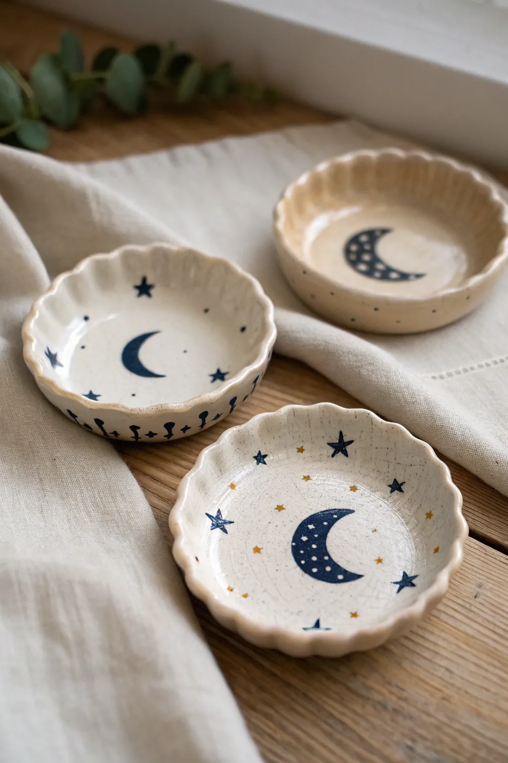 Tiny moon and star trinket dishes in soft glaze—minimal, boho, and beautifully handmade.