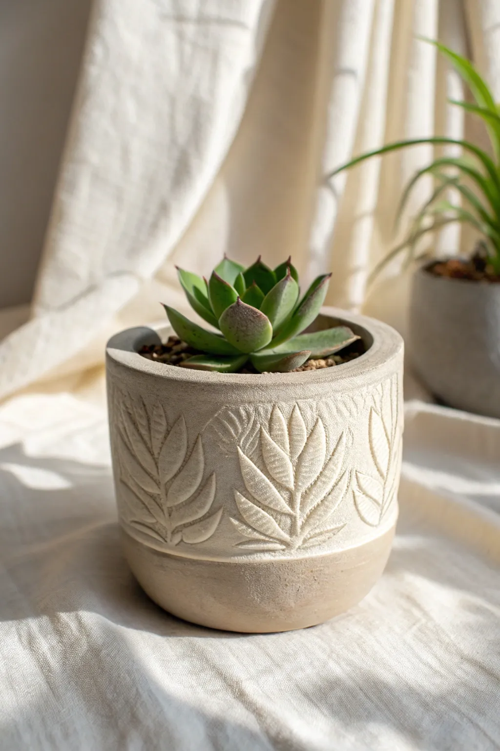 Stamped leaf-texture air-dry clay planter with a soft wash finish for clean boho minimal charm