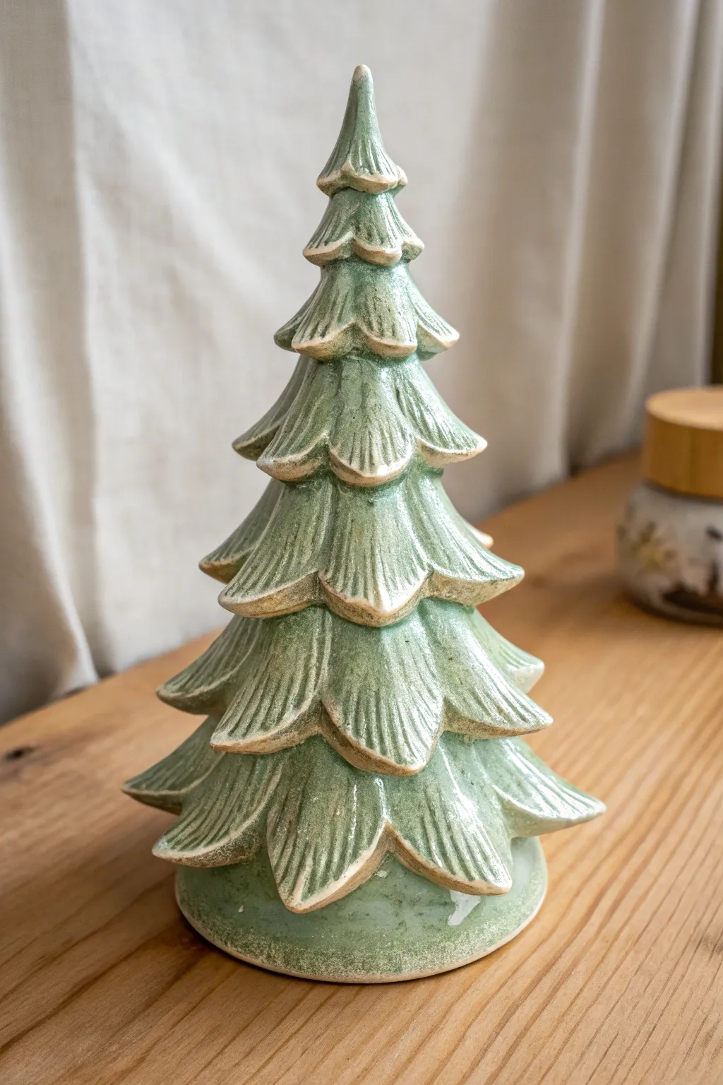 Dry-brushed highlights make each branch pop for an easy, cozy ceramic Christmas tree finish.