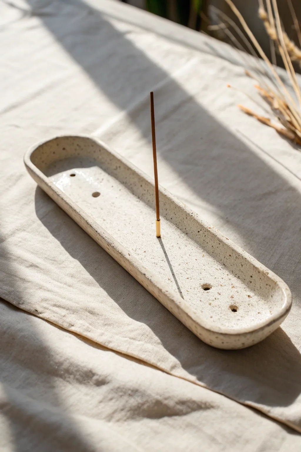 Minimal ceramic incense holder with catch tray, calm neutral tones and handcrafted texture
