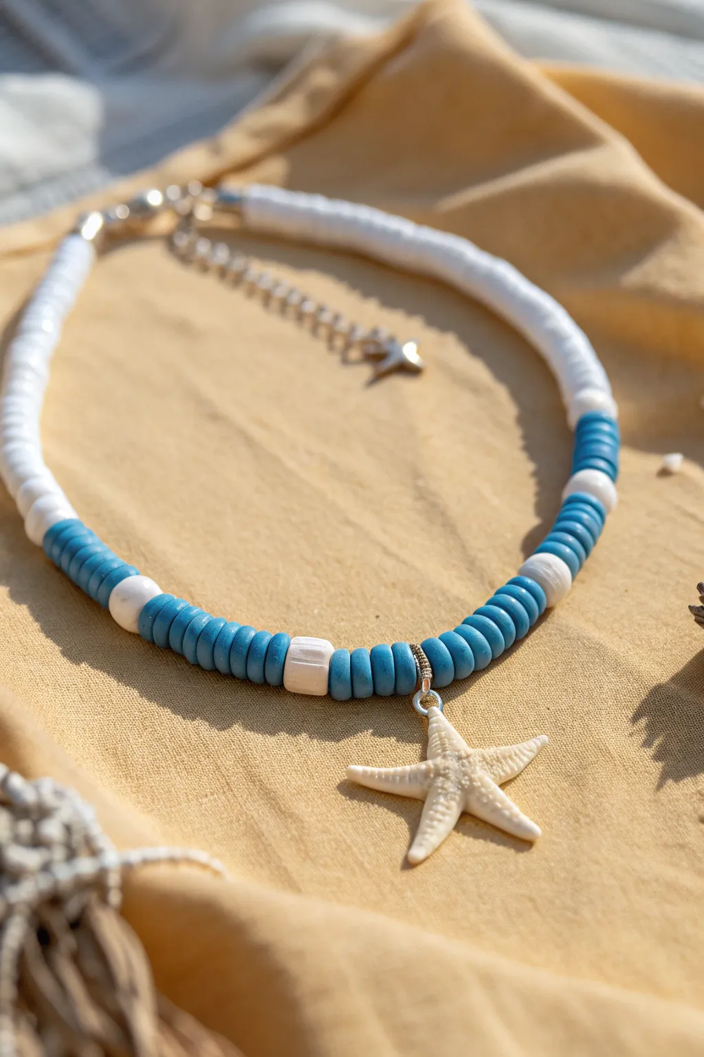 Ocean blue and white heishi beads with a sweet starfish charm, perfect for summer layering.