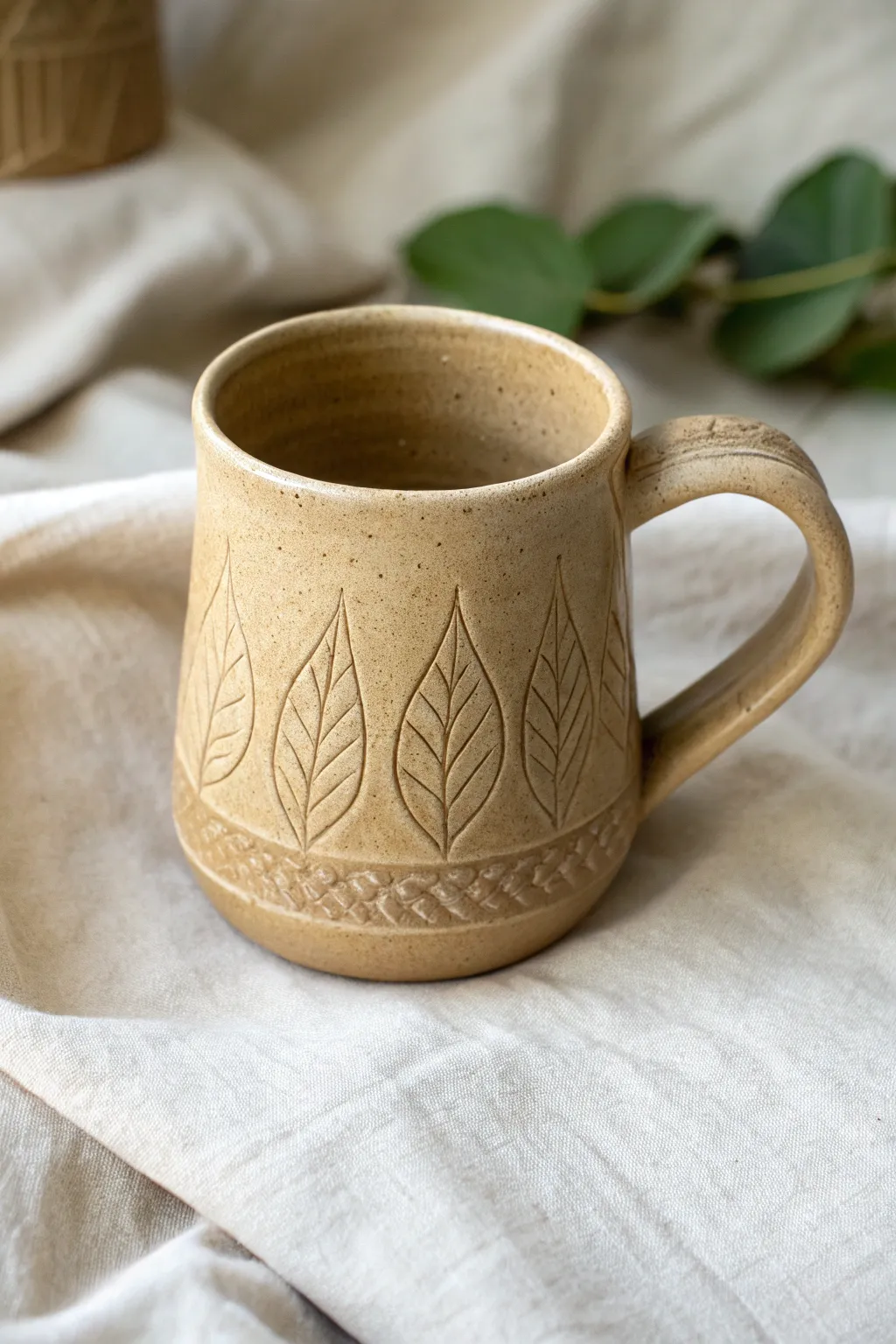 Easy leaf-impression band mug idea with a soft matte glaze and cozy Scandinavian calm