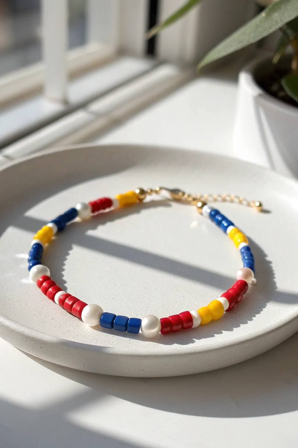 Primary color block heishi bracelet with pearl spacers, clean minimalist contrast and princess vibes