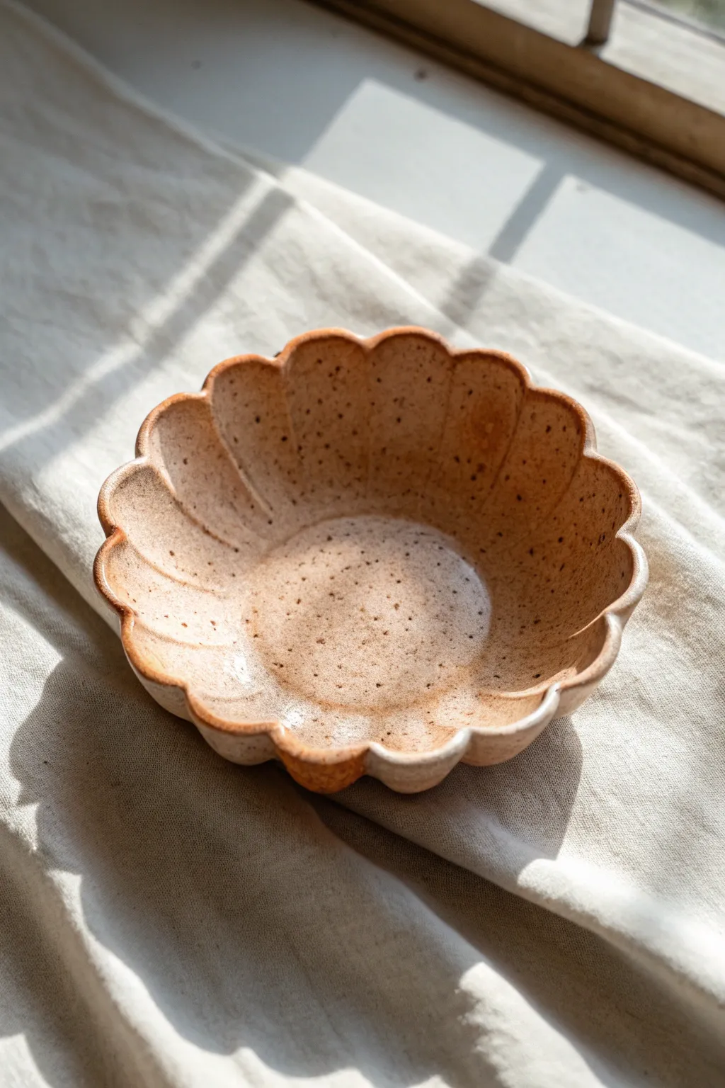 Scalloped petal-edge clay bowl inspiration: simple, feminine curves in a clean Scandinavian style.