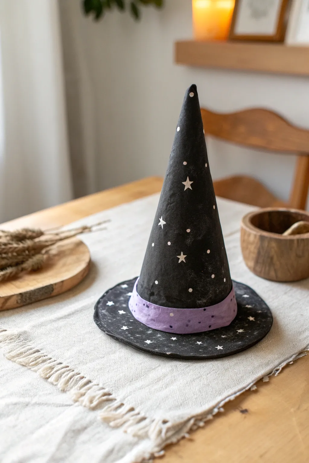 Minimal air dry clay witch hat decor for kids, matte black with purple band and stars