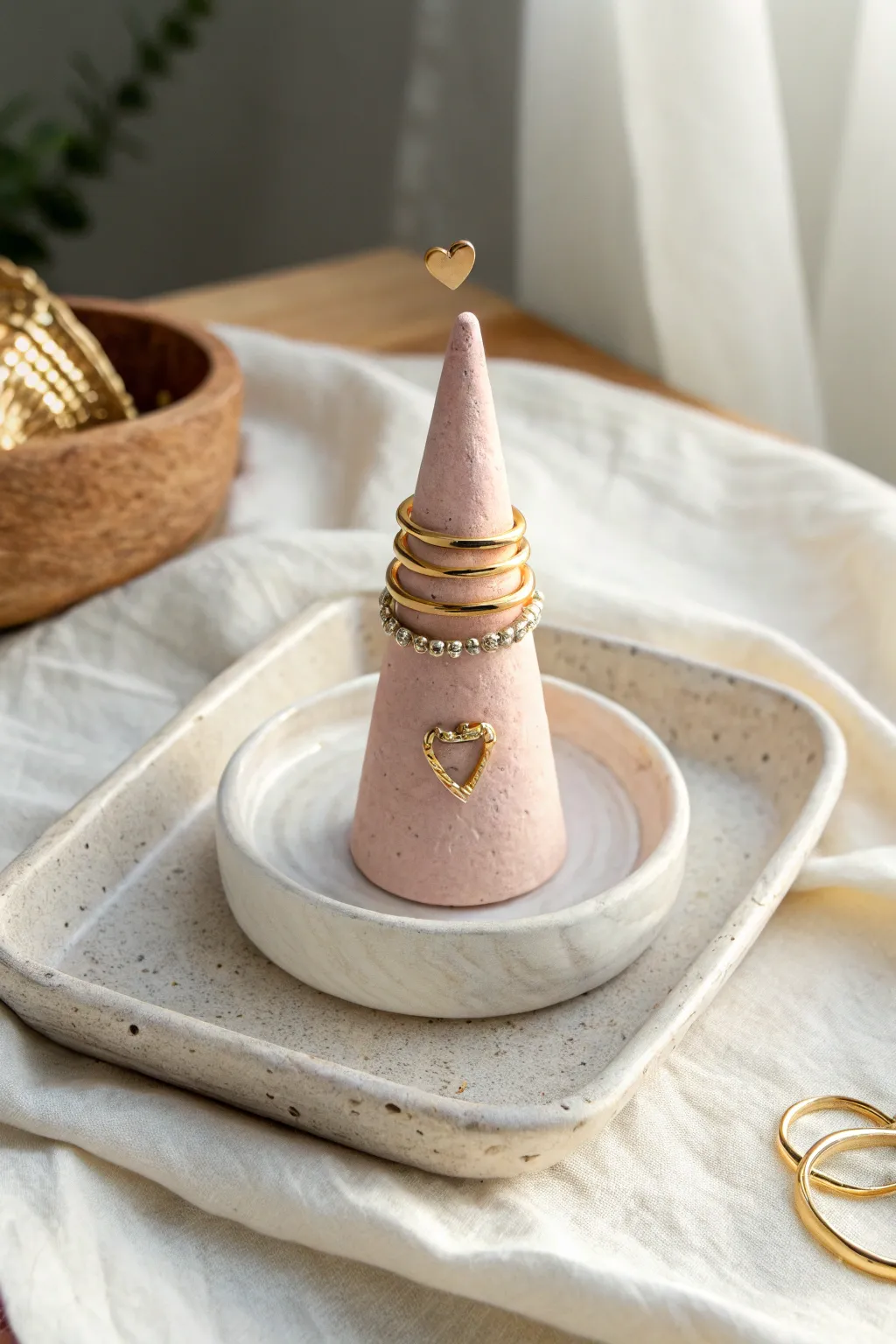 Pastel heart topped ring cone holder, a simple Mothers Day clay gift idea with minimalist charm
