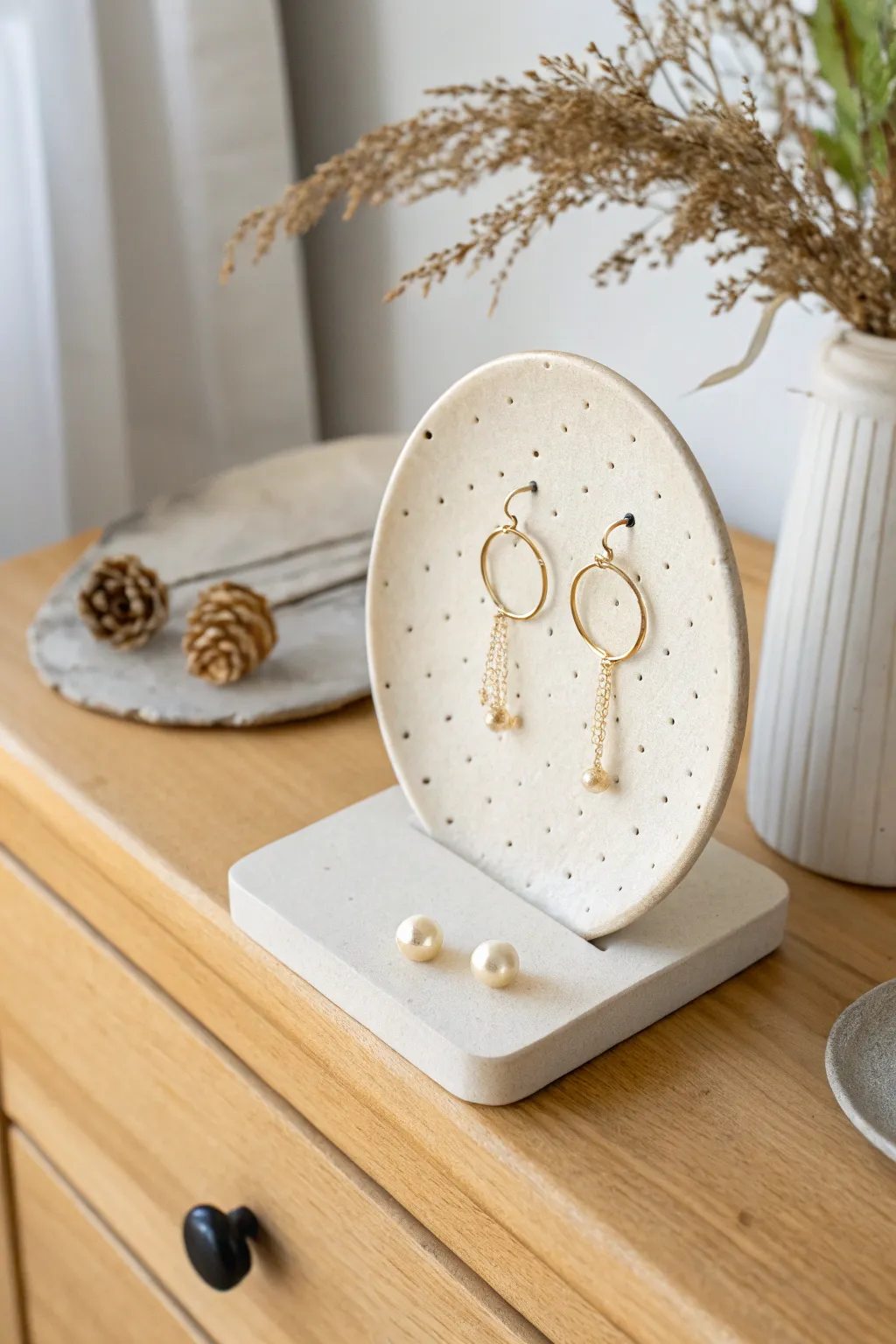Minimal slab clay earring stand with warm matte finish, perfect for a calm, organized vanity