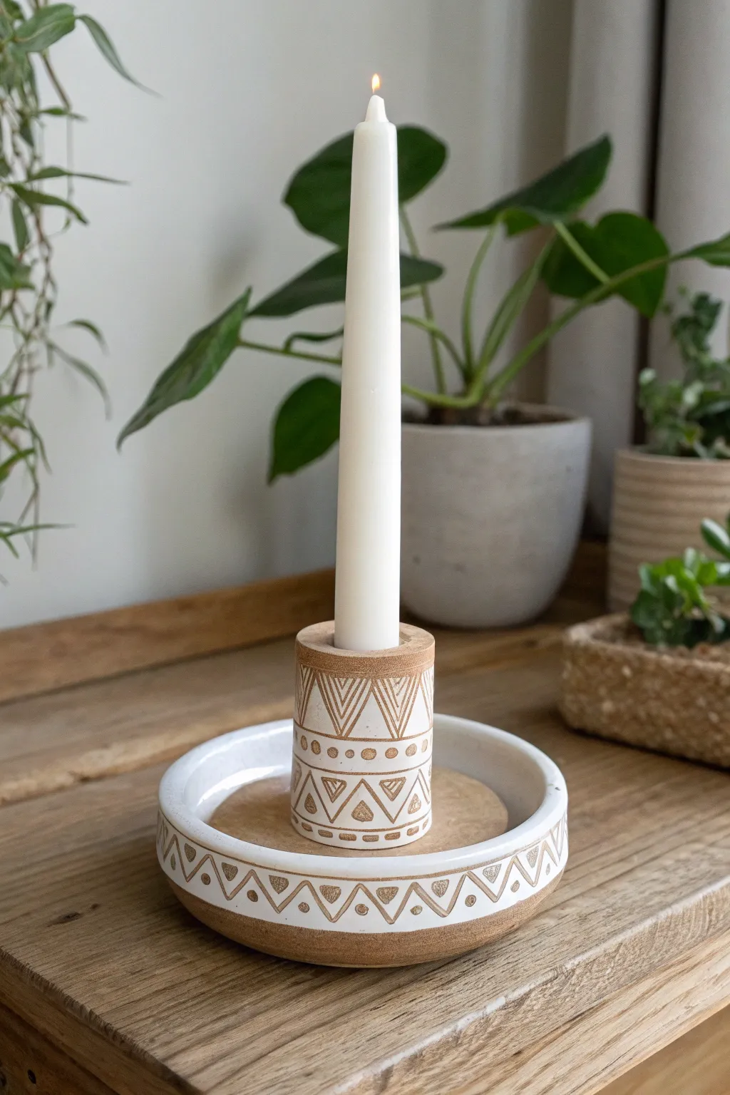 Minimal air dry clay taper holder with a stamped border and soft paint highlight detail