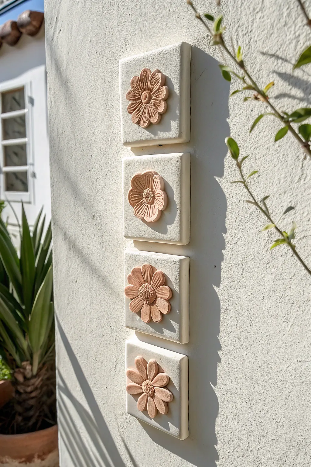 Simple foam clay flower wall tiles in soft blush tones, minimalist boho decor with clean contrast